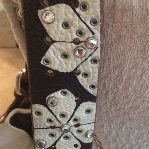 Tylie Malibu white leather studded hobo bag.